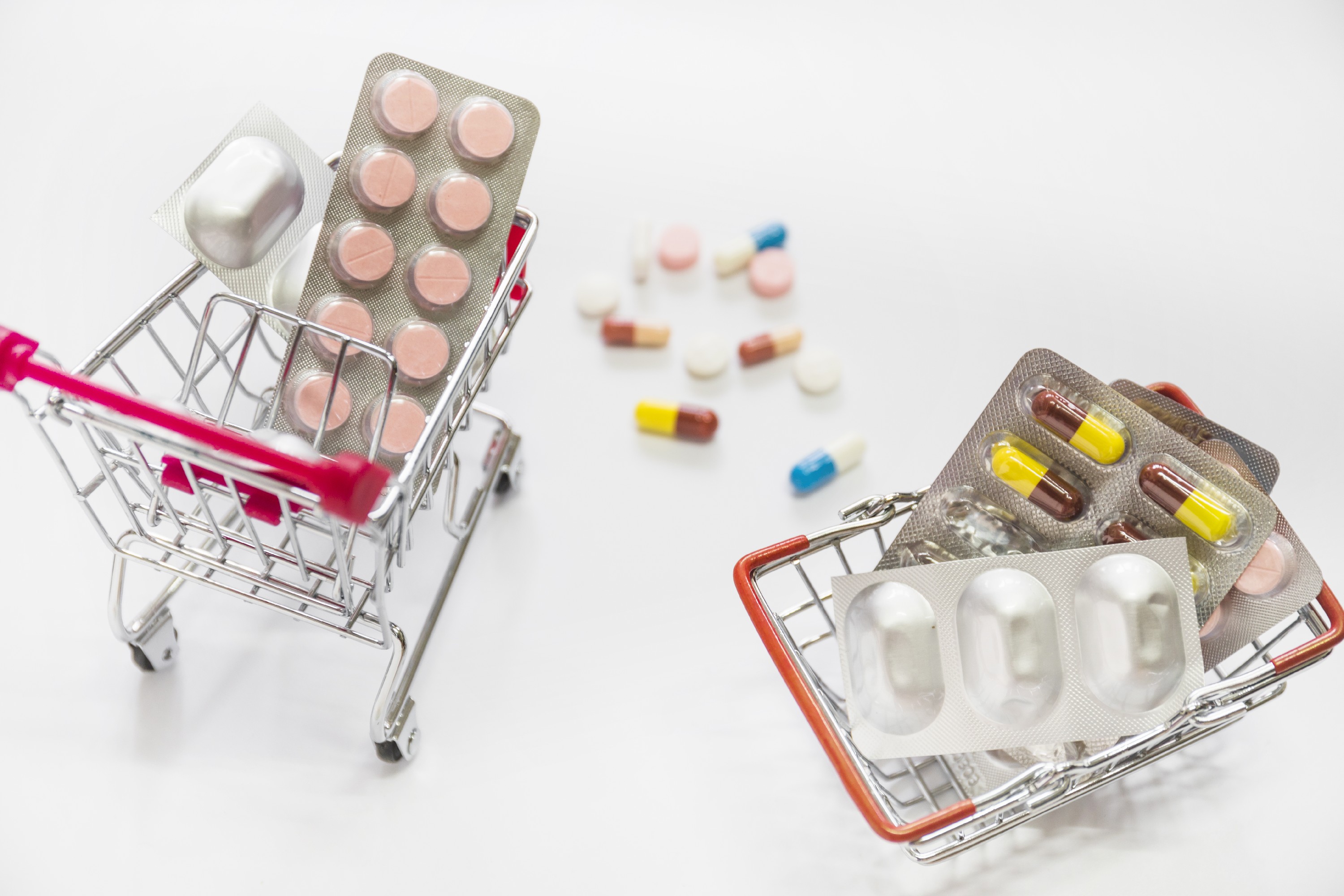 1769581946267021.png pills-medicine-blisters-inside-two-shopping-cart-white-background.jpg